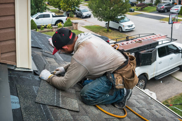 Professional Gutter Repair And Installation technician working in Shelby, MI